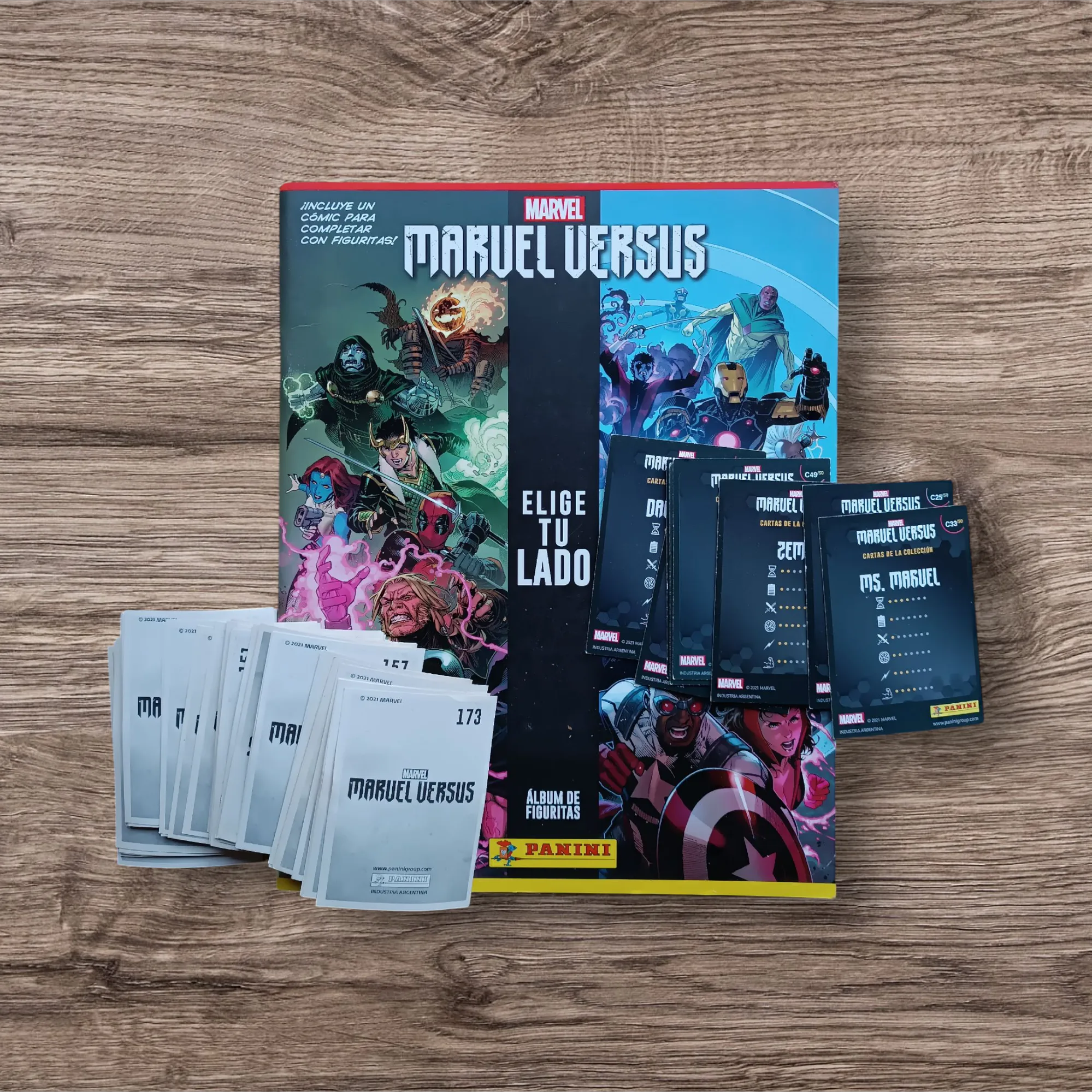 Extraordinario combo de álbum + 65 figuritas + 8 cartas Marvel Versus